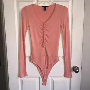 Peach ribbed body suit
